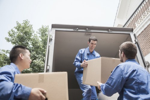 Supervisor checking safe working practices during a removal job