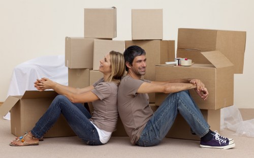 Careful furniture wrapping during a flat relocation in Ruislip