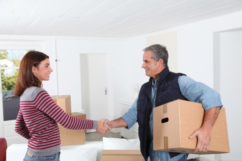 Packed moving boxes and furniture prepared for removals in Ruislip
