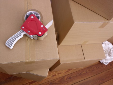 Packed office technology and supplies ready for commercial removal in Ruislip